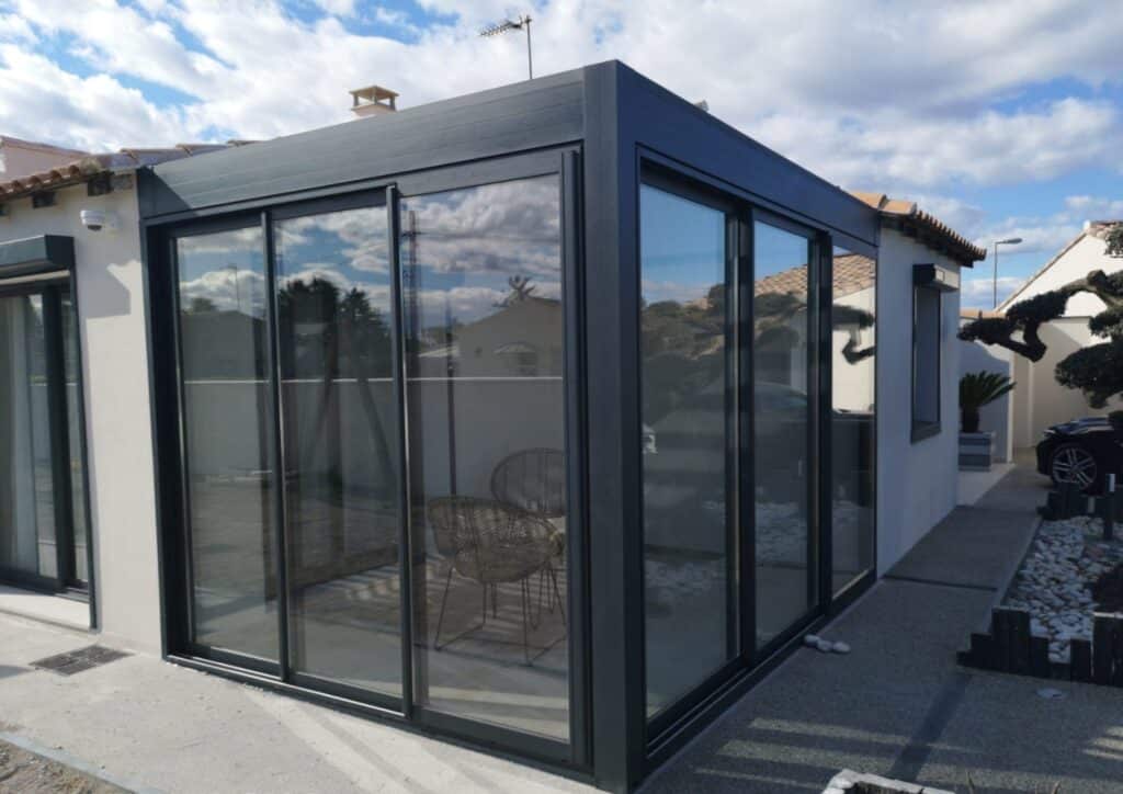 Véranda aluminium réalisée par PGI-Habitat