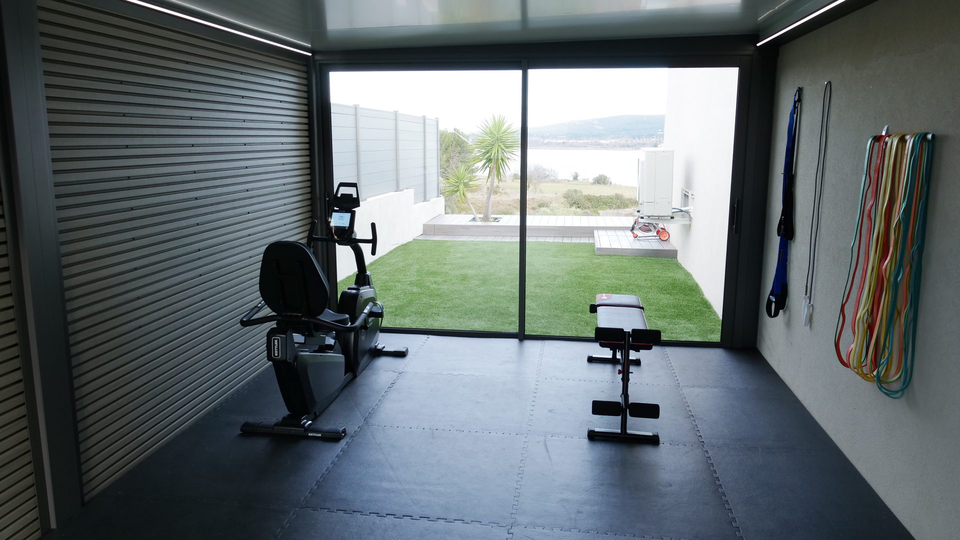 Un home gym vitré, lumineux et bien ventilé